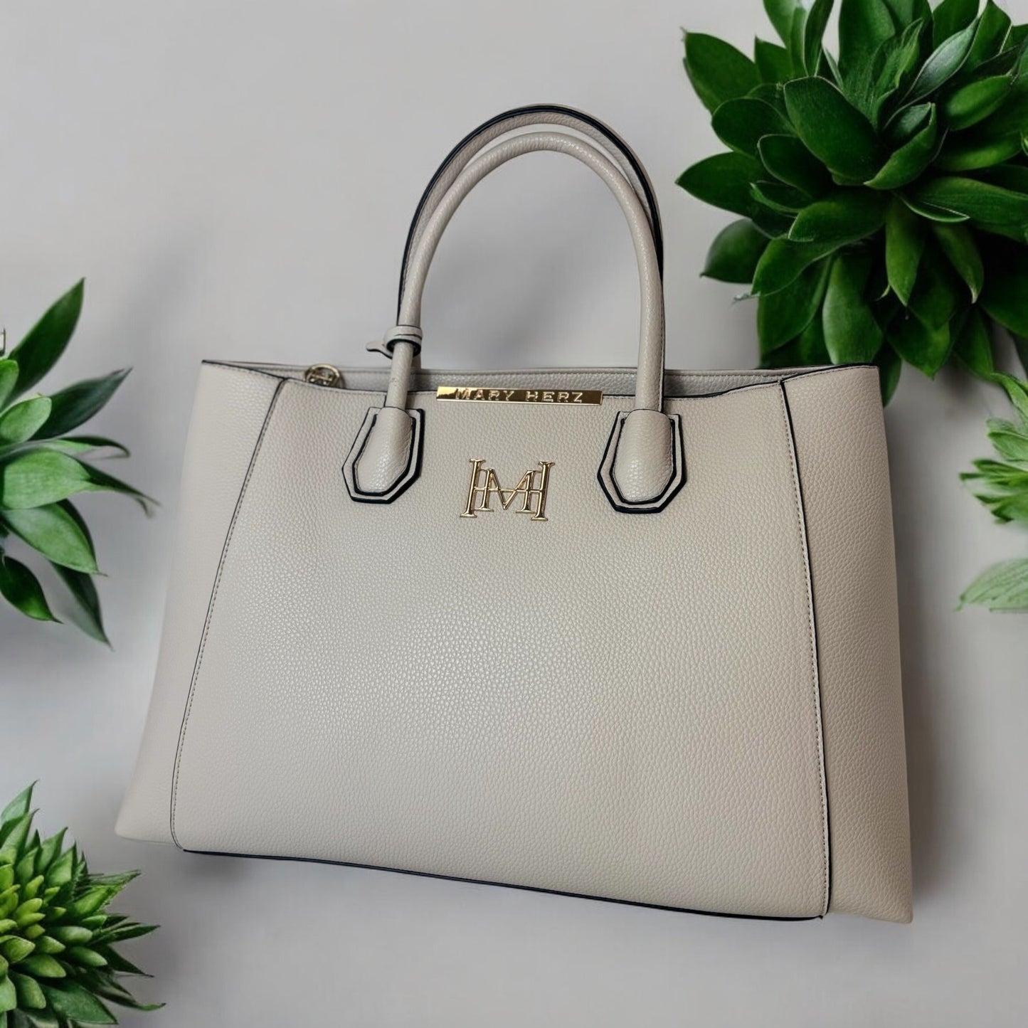 MH DELUXE HANDBAGS