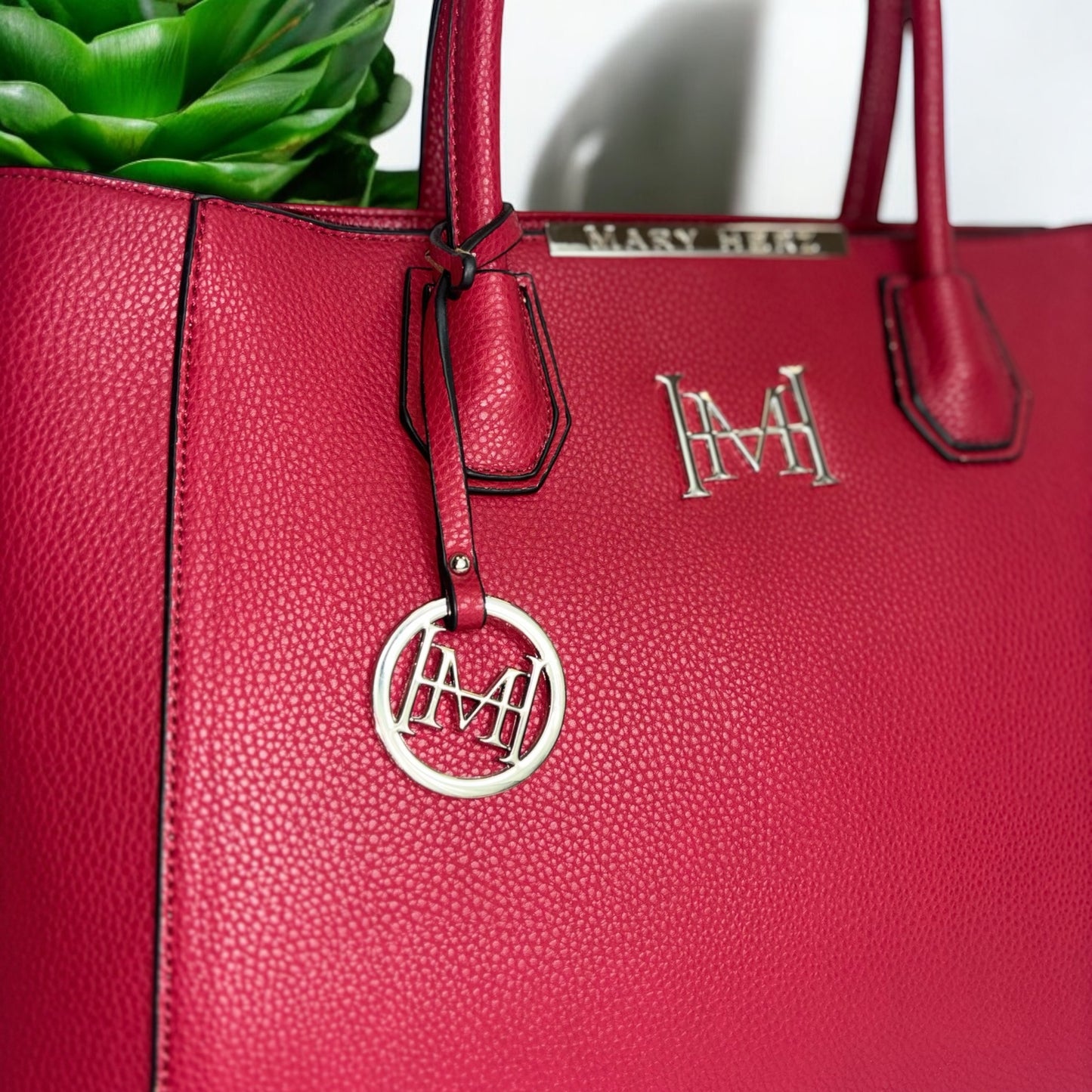 MH DELUXE HANDBAGS