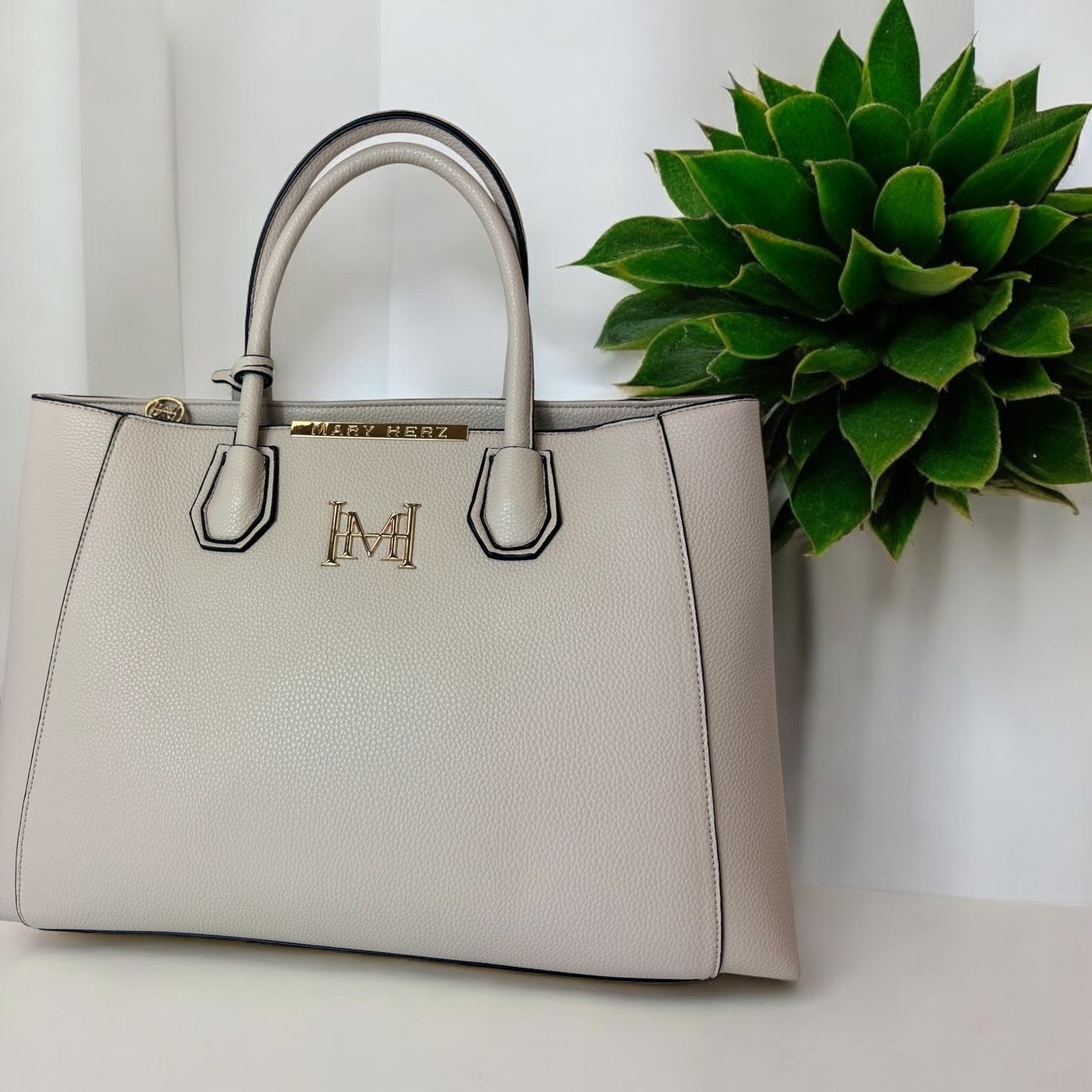 MH DELUXE HANDBAGS